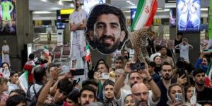 رغم الخروج المبكر، استقبال شعبي لمنتخب إيران بعد العودة من كأس العالم - المدينة برس