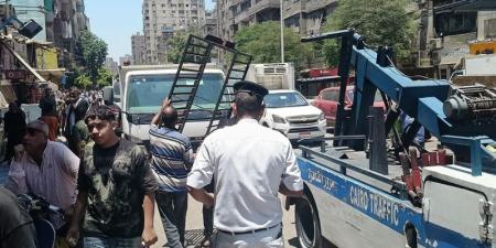 حملة لرفع الاشغالات من شوارع دار السلام بالقاهرة - المدينة برس