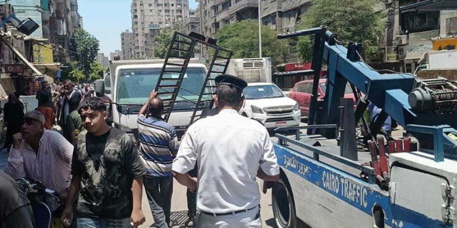 حملة لرفع الاشغالات من شوارع دار السلام بالقاهرة - المدينة برس
